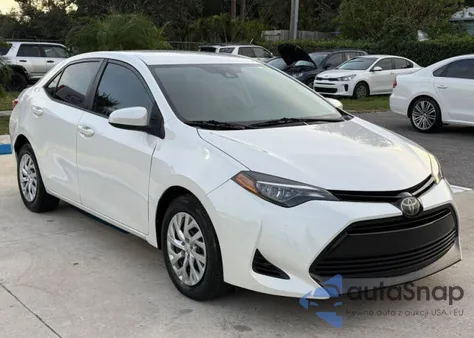 2018 Toyota Corolla L z USA, uszkodzony, nr VIN 5YFBURHE4JP828XXX